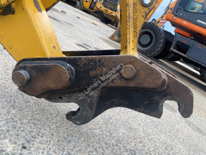 Traktor med grab Caterpillar 2 NVT
