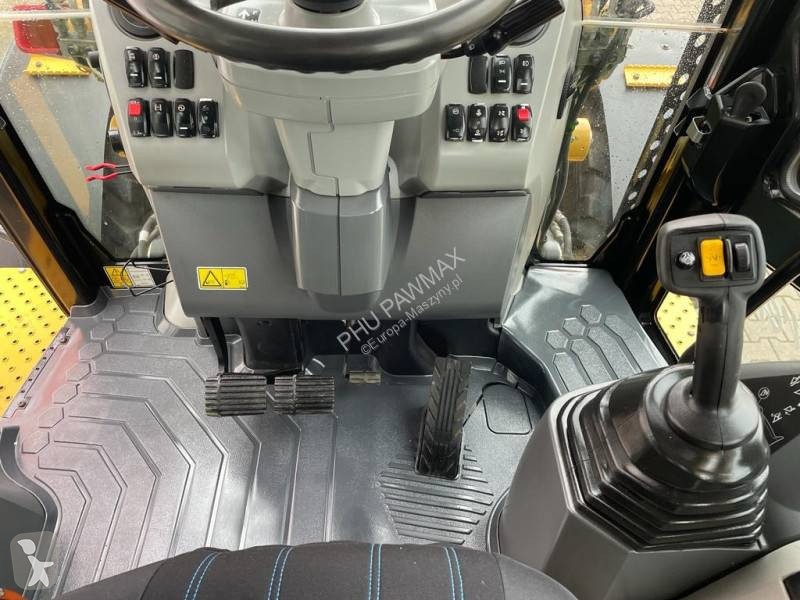 Traktor med grab Caterpillar 444 F2