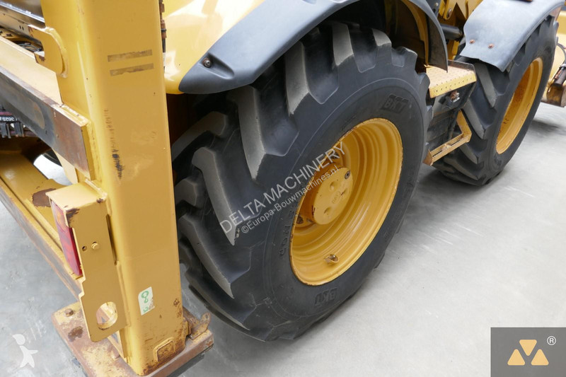 Traktor med grab Caterpillar 444F