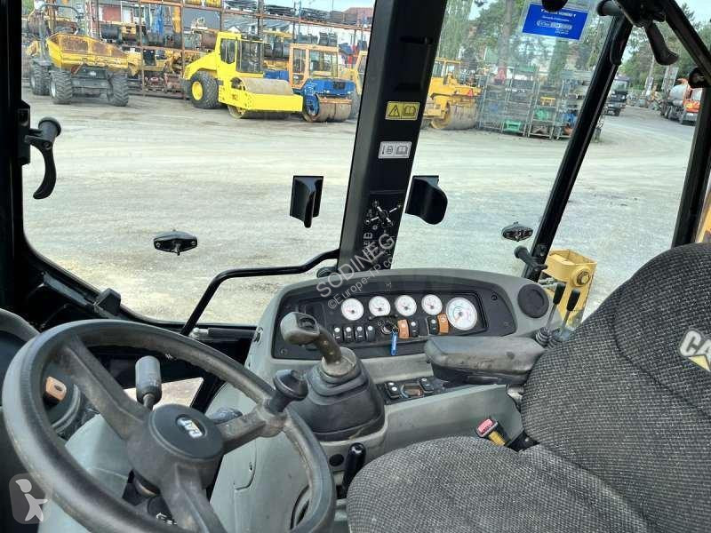 Экскаватор-погрузчик Caterpillar