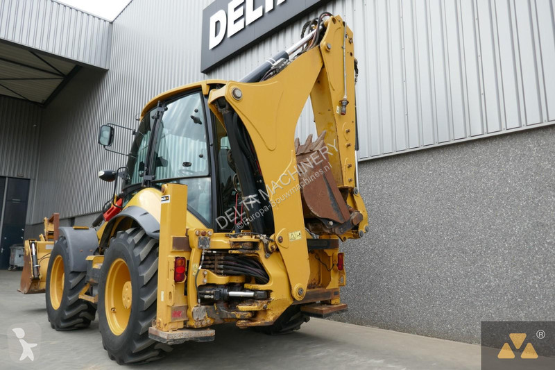 Traktor med grab Caterpillar 444F