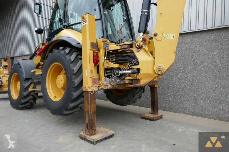 Traktor med grab Caterpillar 444F