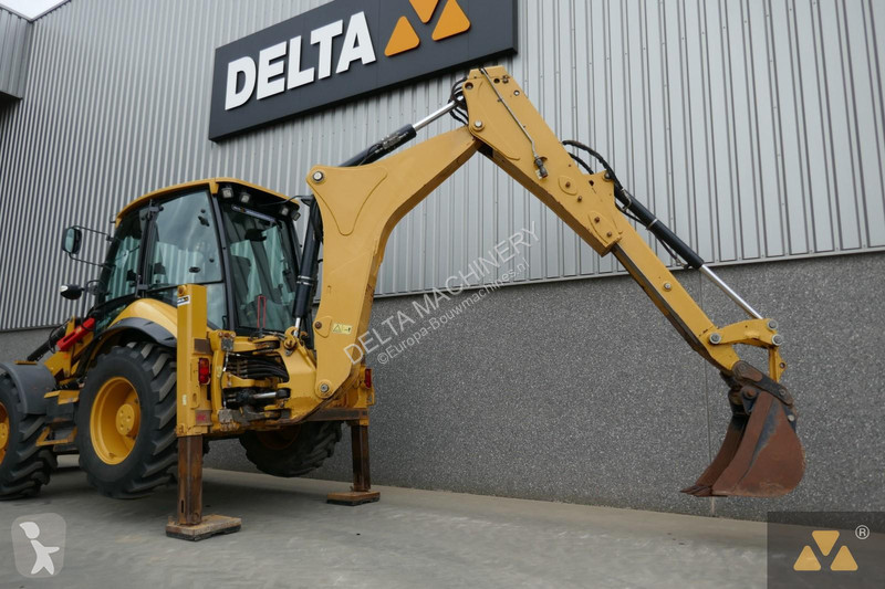 Traktor med grab Caterpillar 444F