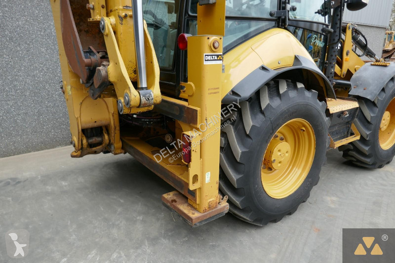 Traktor med grab Caterpillar 444F