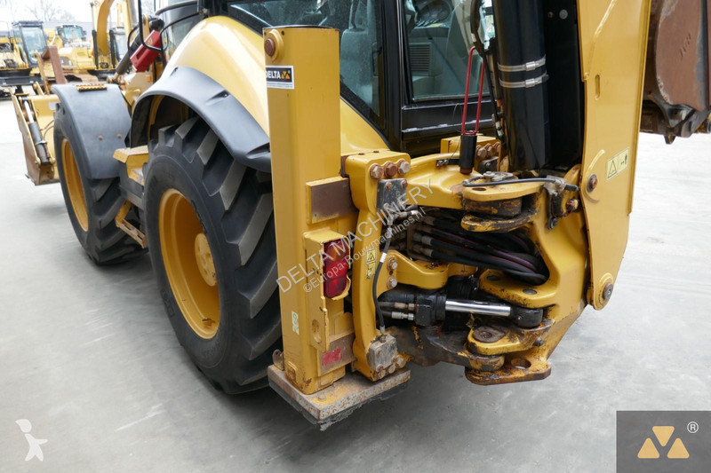Traktor med grab Caterpillar 444F