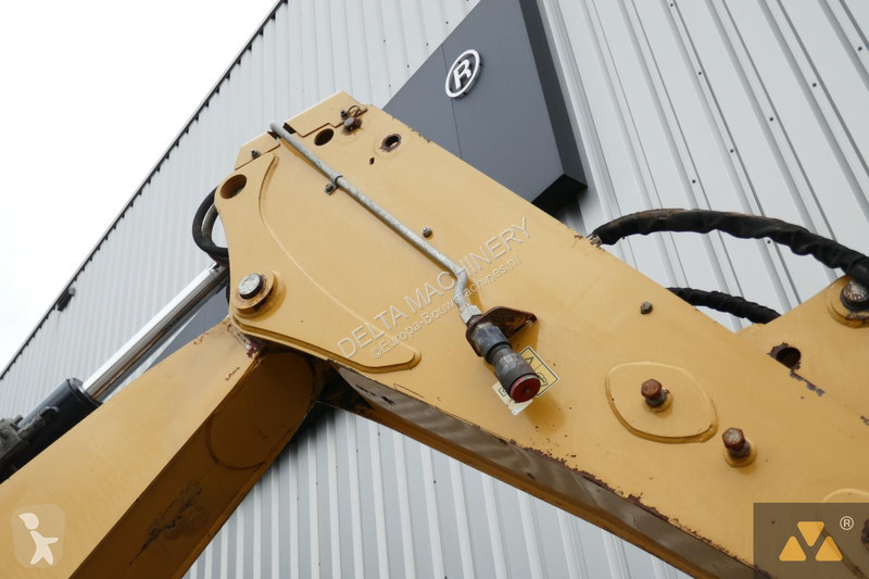 Traktor med grab Caterpillar 444F
