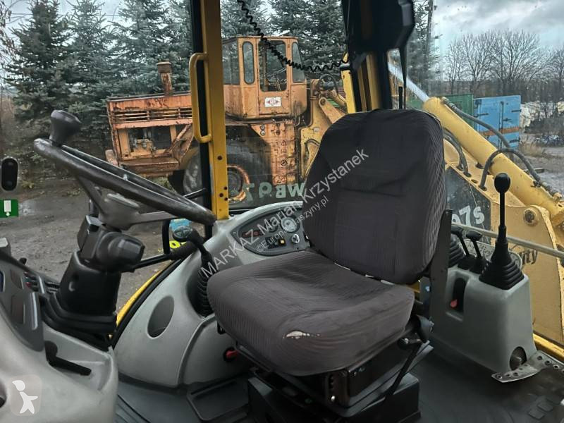 Retroescavadora Komatsu Koparko-ładowarka...