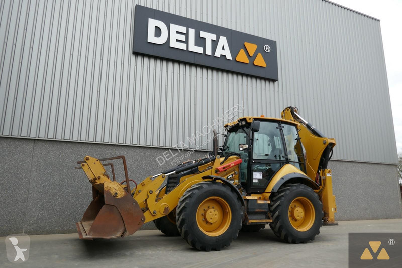 Traktor med grab Caterpillar 444F