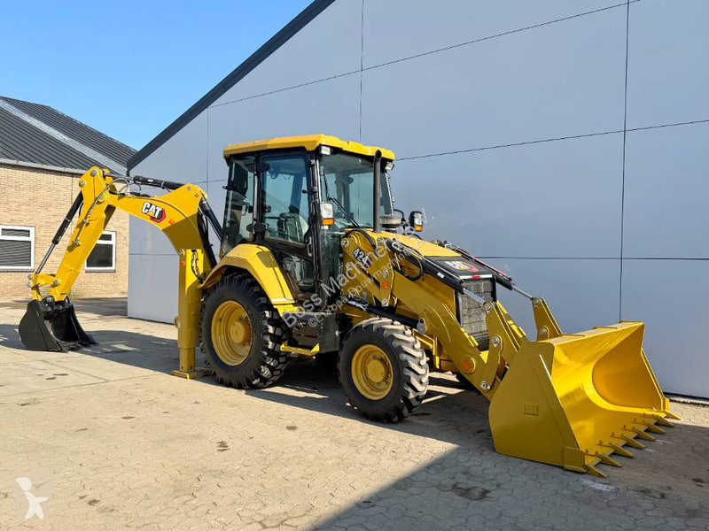 Traktor med grab Caterpillar 424 4WD - Hammer...