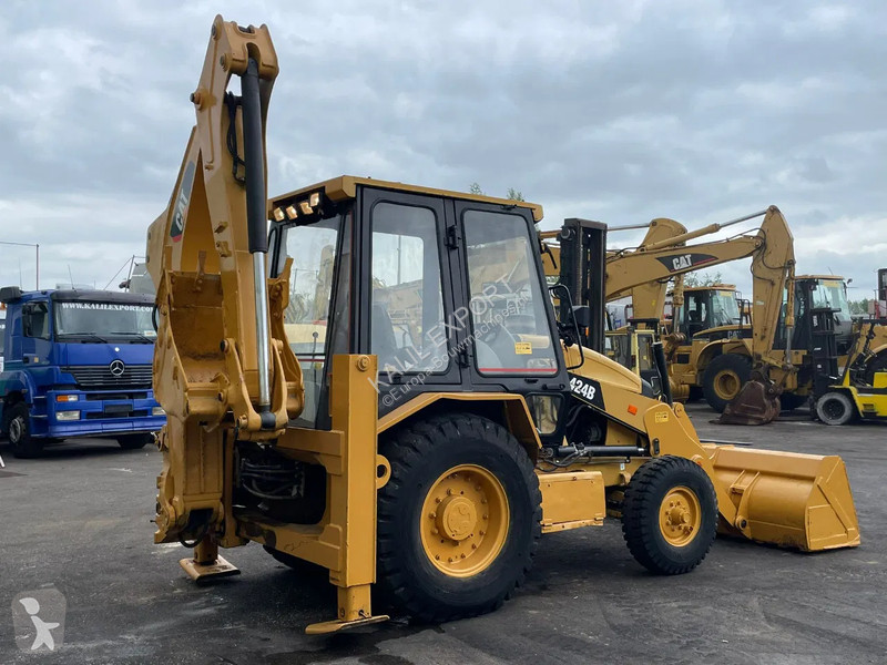 Traktor med grab Caterpillar 424B Backhoe...