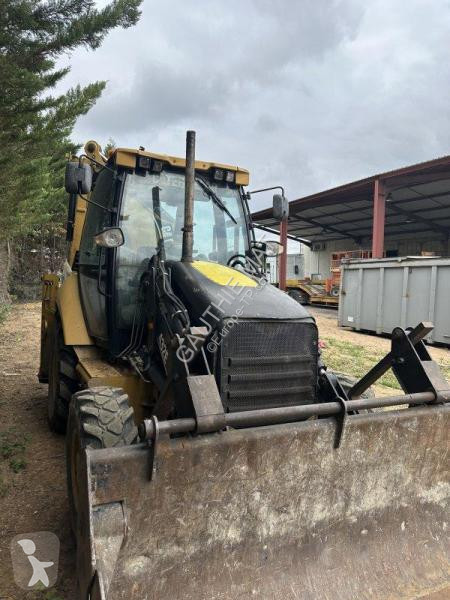 Buldoexcavator Caterpillar
