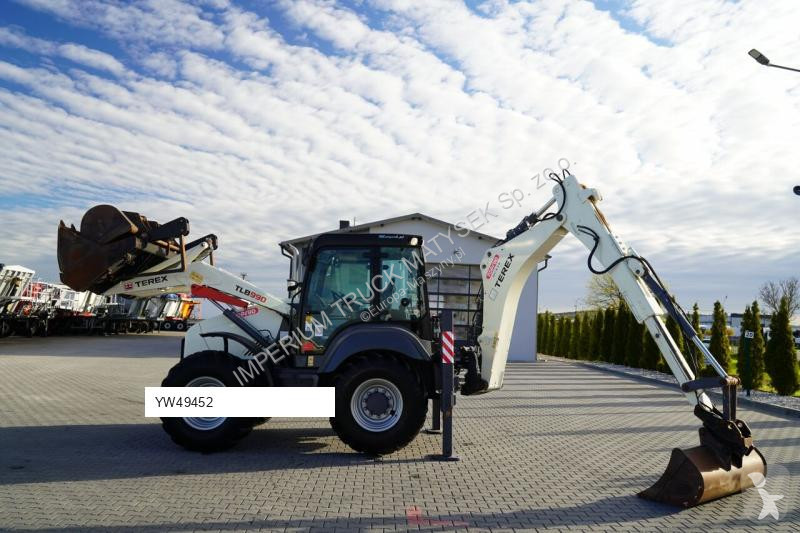 Traktor med grab Terex TLB 990