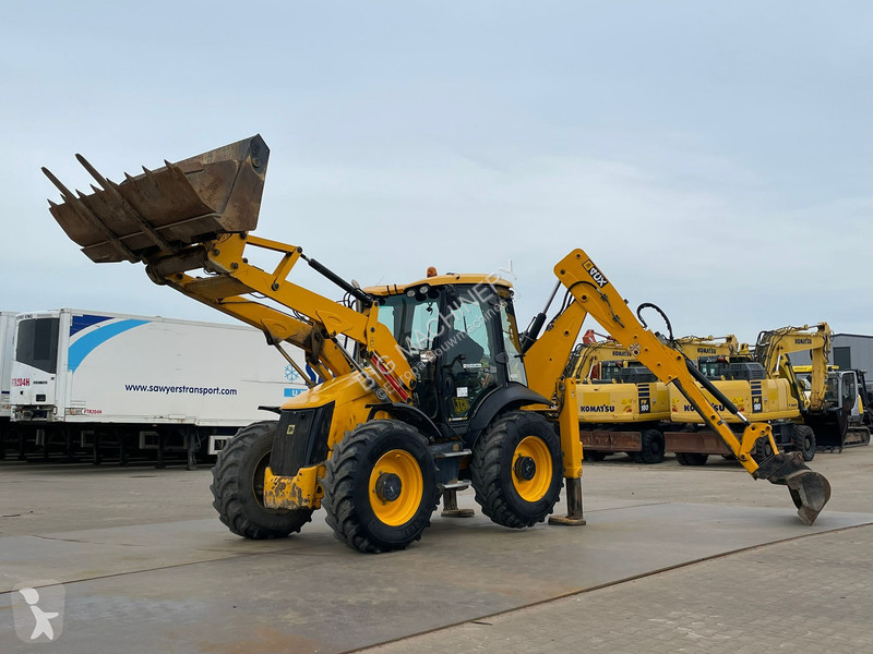 Traktor med grab JCB