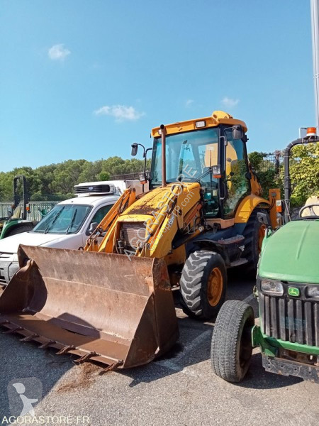 Traktor med grab JCB
