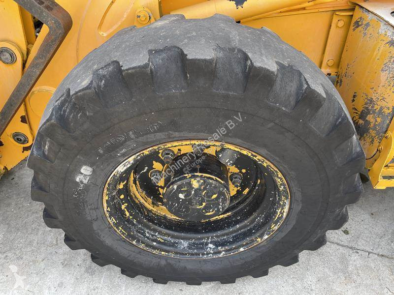 Traktor med grab Caterpillar