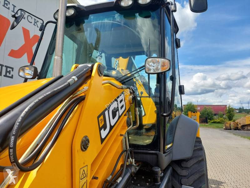 Traktor med grab JCB