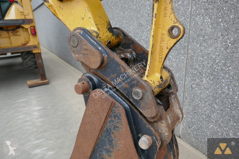 Traktor med grab Caterpillar 444F