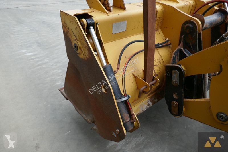 Traktor med grab Caterpillar 444F