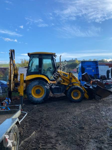 Traktor med grab JCB
