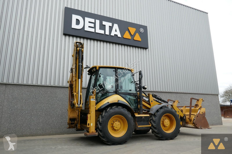Traktor med grab Caterpillar 444F