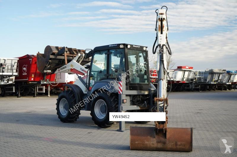 Traktor med grab Terex TLB 990