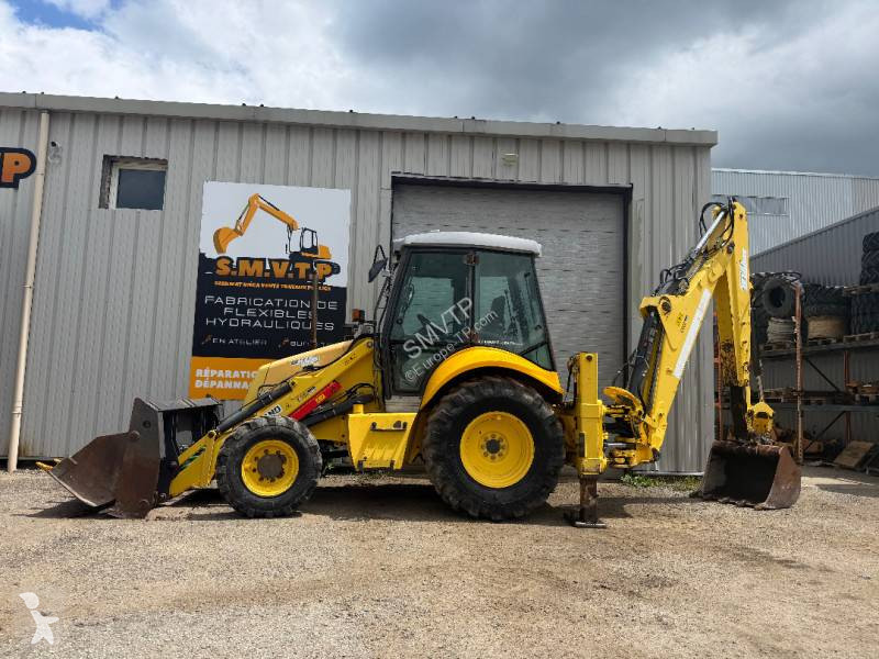 لودر حفار New Holland