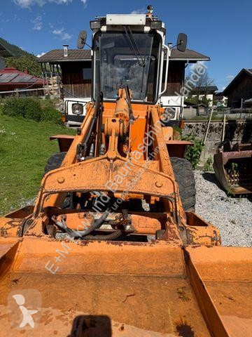 Traktor med grab Liebherr 506