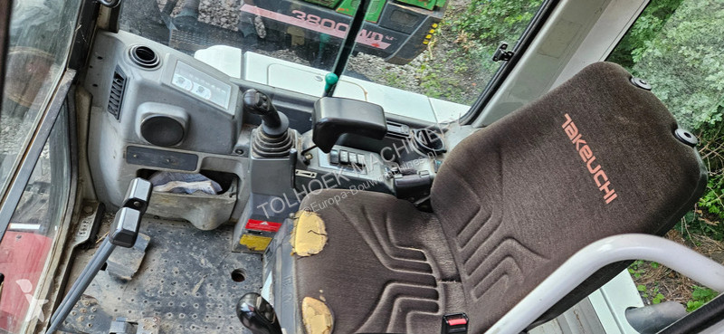 Traktor med grab Takeuchi TB 235