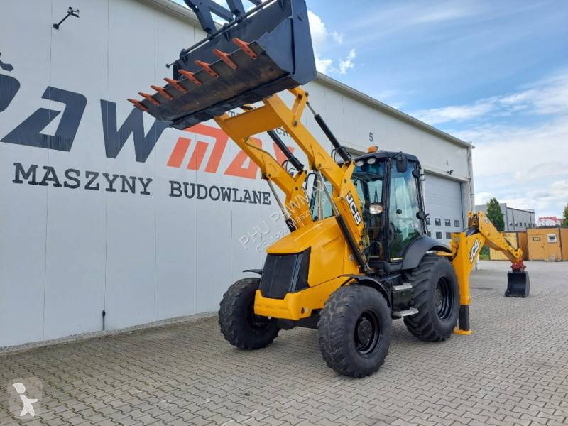 Traktor med grab JCB