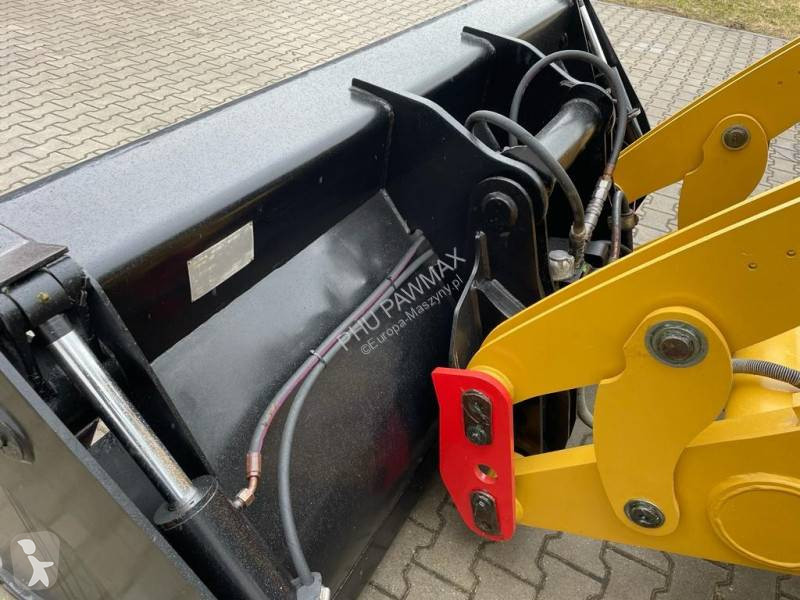 Traktor med grab Caterpillar 444 F2
