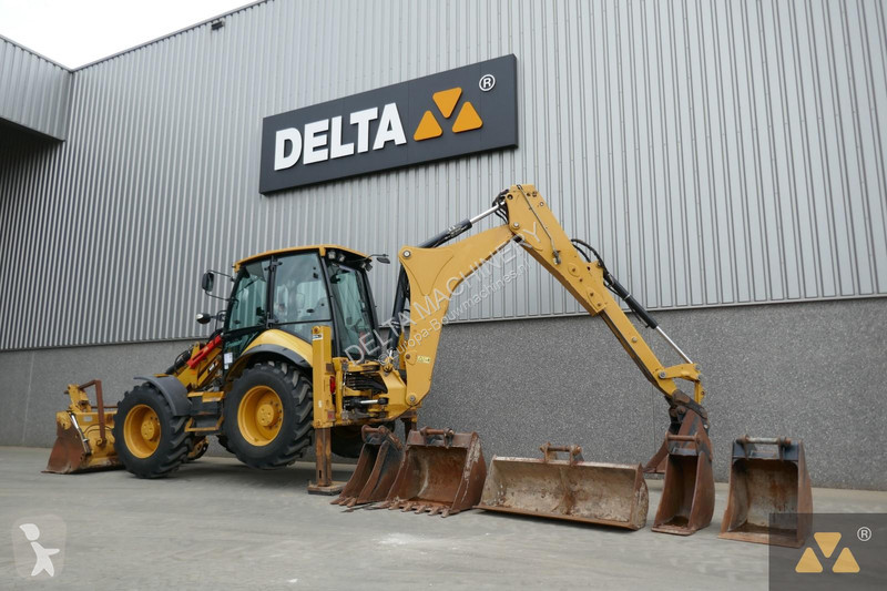Traktor med grab Caterpillar 444F