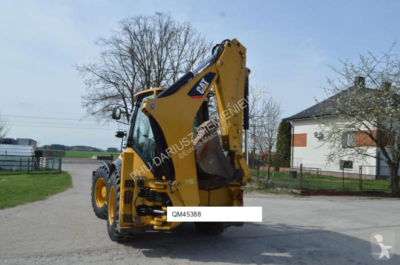 Traktor med grab Caterpillar 444F