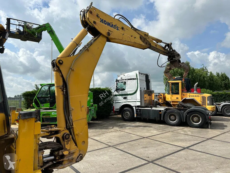Traktor med grab Komatsu E0
