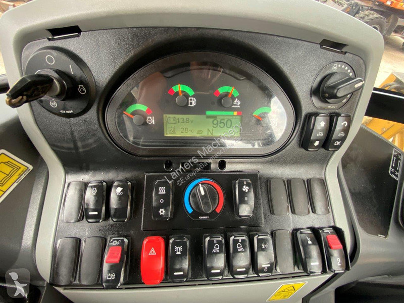 Traktor med grab Caterpillar 2 NVT