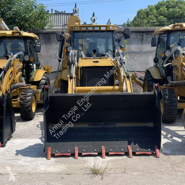 Rýpadlo-nakladač Caterpillar backhoe loader...