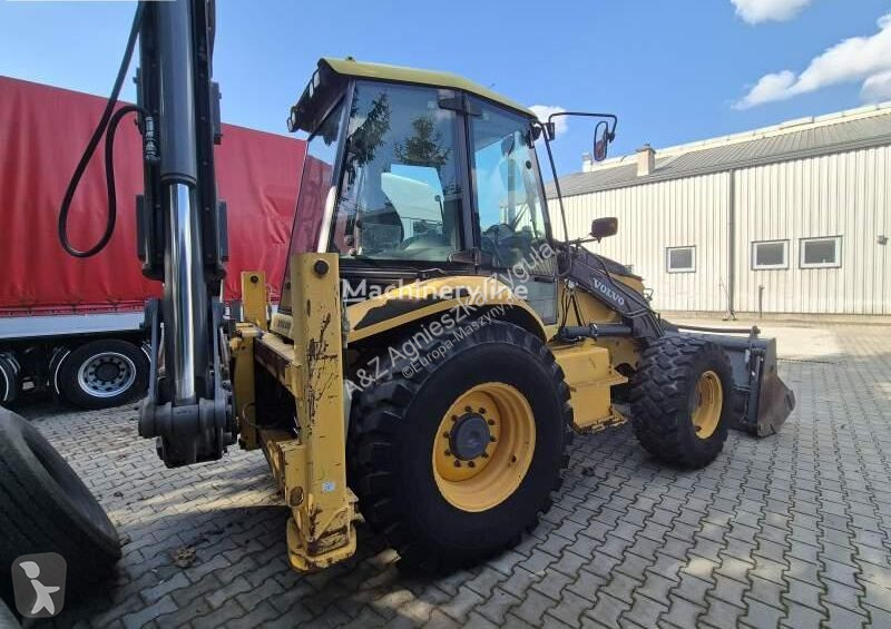 Traktor med grab Volvo