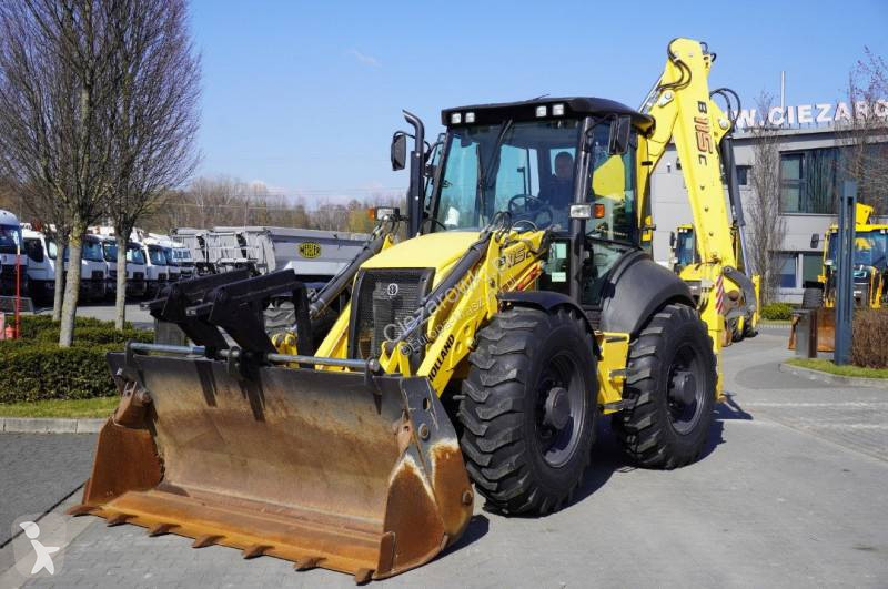 Buldoexcavator New Holland C backhoe loader /...