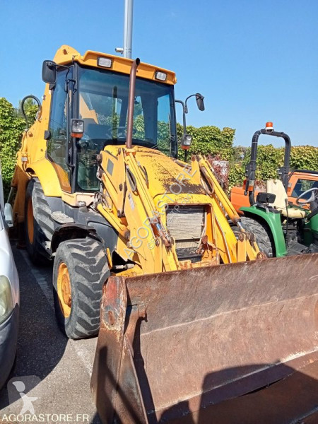 Traktor med grab JCB
