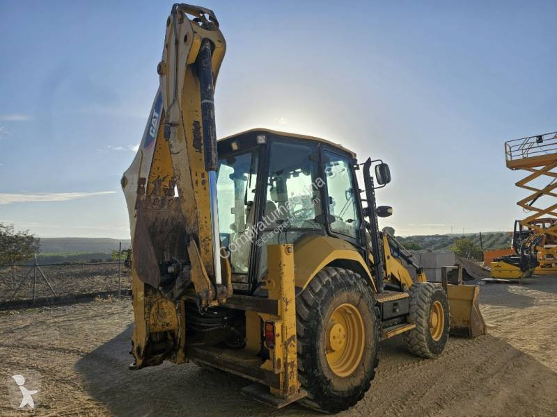 Buldoexcavator Caterpillar