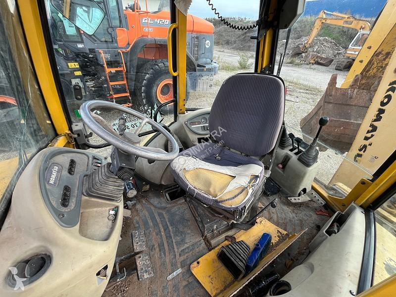 Buldoexcavator Komatsu