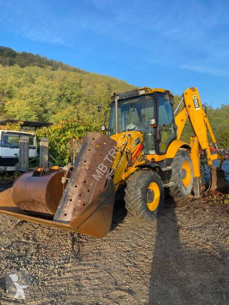 Traktor med grab JCB