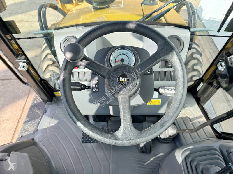 Traktor med grab Caterpillar 424 4WD - Hammer...