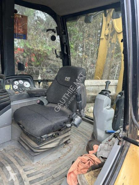 Buldoexcavator Caterpillar