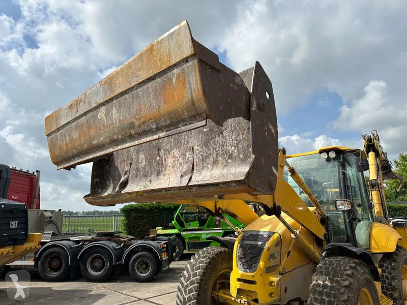 Traktor med grab Komatsu E0
