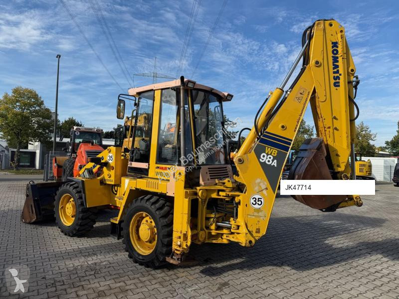 Traktor med grab Komatsu