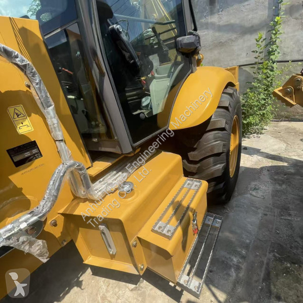 Rýpadlo-nakladač Caterpillar backhoe loader...