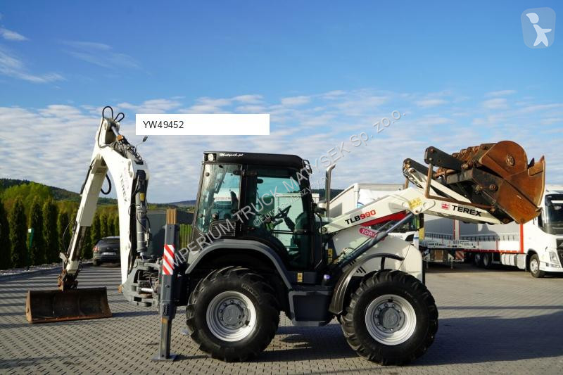 Traktor med grab Terex TLB 990