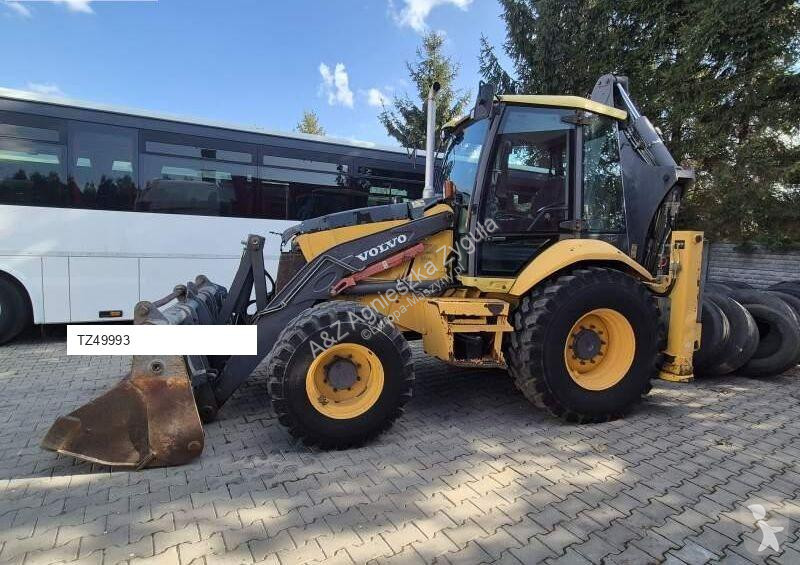 Traktor med grab Volvo