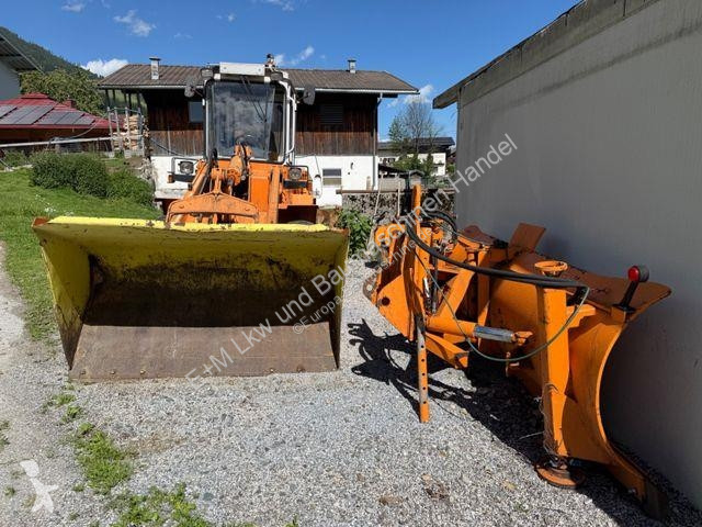 Traktor med grab Liebherr 506
