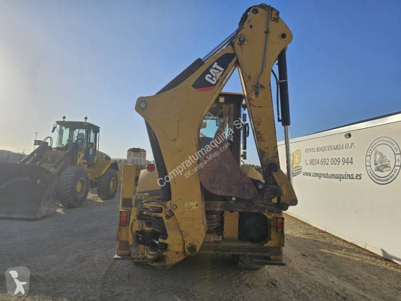 Buldoexcavator Caterpillar